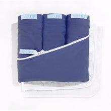 Load image into Gallery viewer, Deluxe Crib Starter Pack in Navy: Includes 1 Wraparound Base + 3 Cotton Zip-On Sheets + 2 Waterproof Flat Felt Mattress Pads