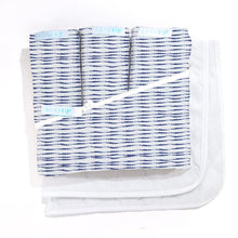 Load image into Gallery viewer, Deluxe Crib Starter Pack in Navy Shibori: Includes 1 Wraparound Base + 3 Cotton Zip-On Sheets + 2 Waterproof Flat Felt Mattress Pads