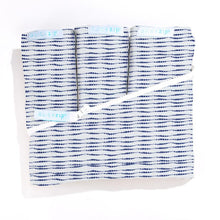 Load image into Gallery viewer, Premium Crib Starter Pack in Navy Shibori: Includes 1 Wraparound Base + 3 Zip-On Sheets