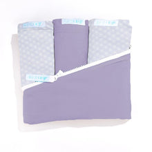 Load image into Gallery viewer, Premium Crib Starter Pack in Lavender, Lavender Wave: Includes 1 Wraparound Base in Lavender + 3 Cotton Zip-On Sheets (1 Lavender and 2 Lavender Wave)
